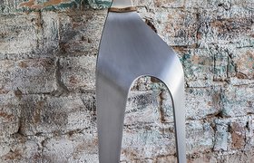  A Chair Made From A Single Piece Of Bent Aluminum