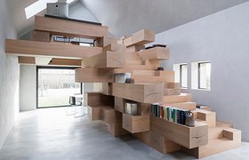 简单木板堆叠，一个谷仓竟变成了会议室，图书馆，办公室
